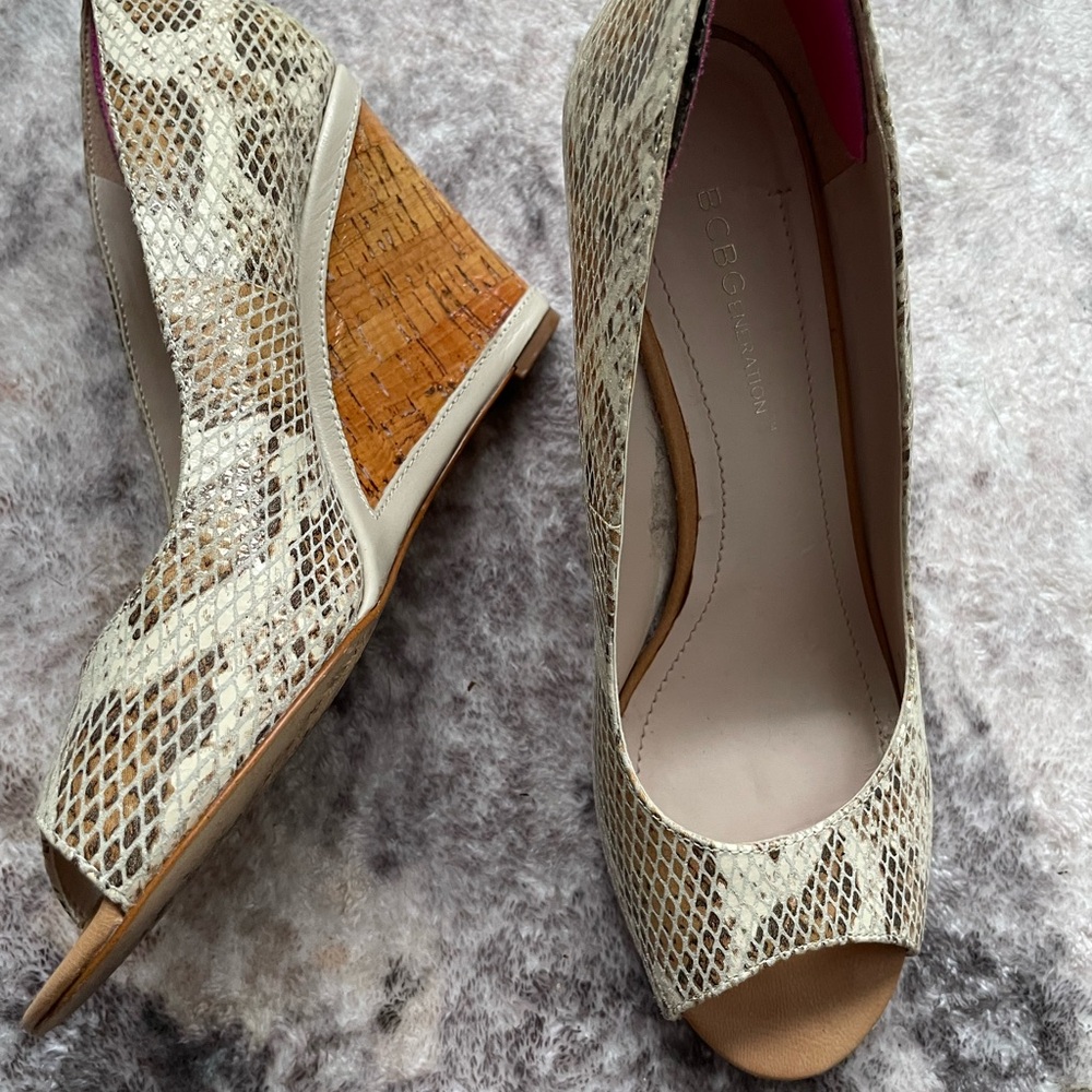 BCBGeneration Women's Snakeskin Wedge Heels